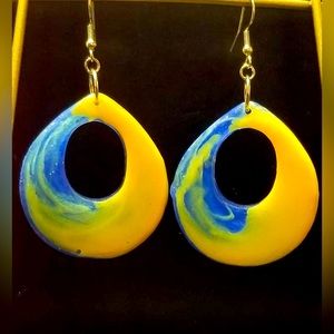 Handcrafted Glow in the Dark resin earrings.